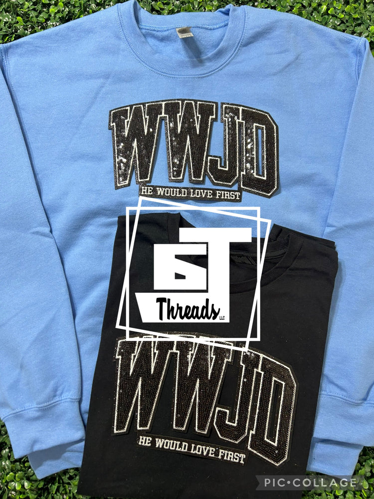 sequin wwjd patch on light blue sweatshirt and black shirt