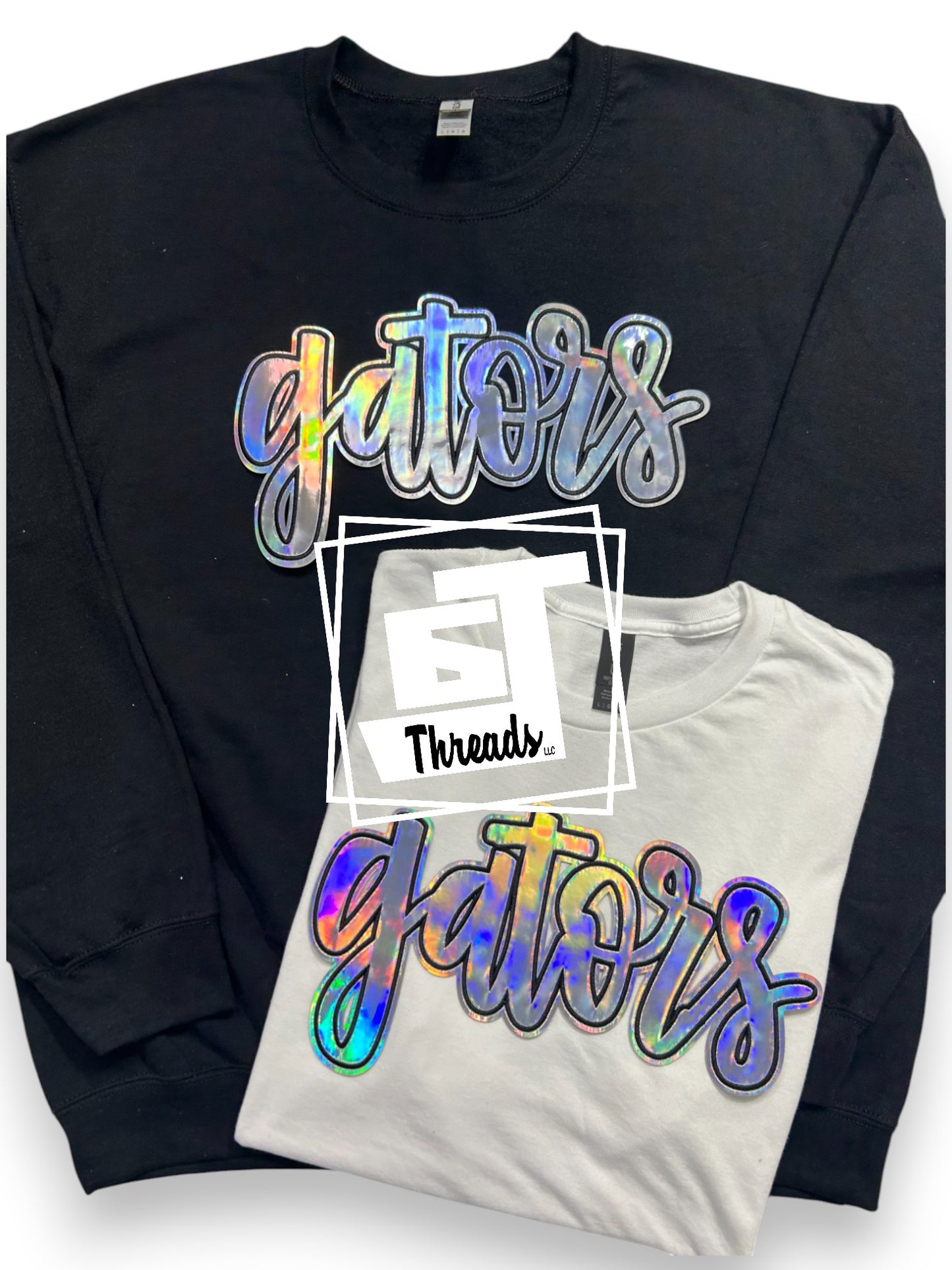Silver Cursive Metallic Gators on black sweatshirt and white shirt
