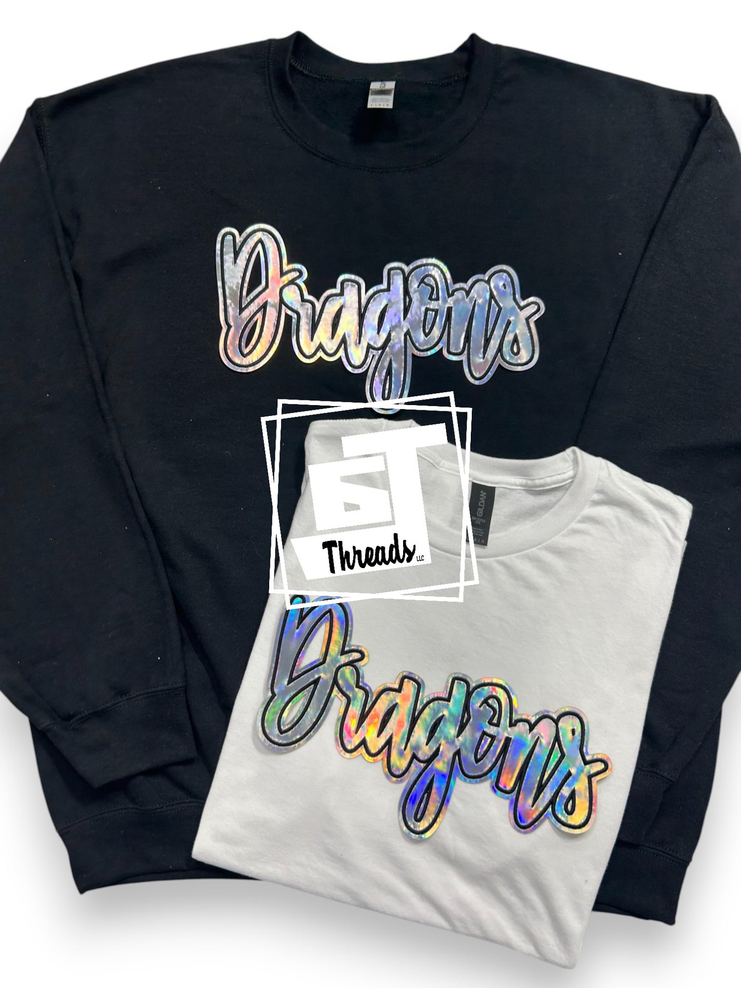 Silver Cursive Metallic Dragons on black sweatshirt and white shirt