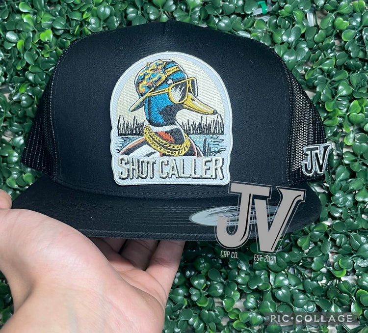 jv shot caller on black cap