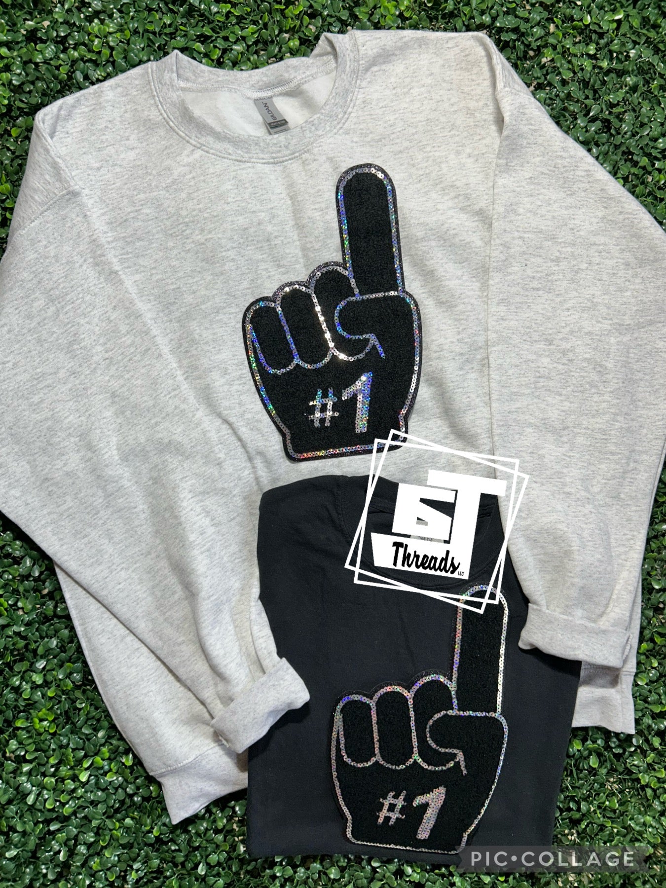 foam finger patch on gray sweatshirt and black shirt