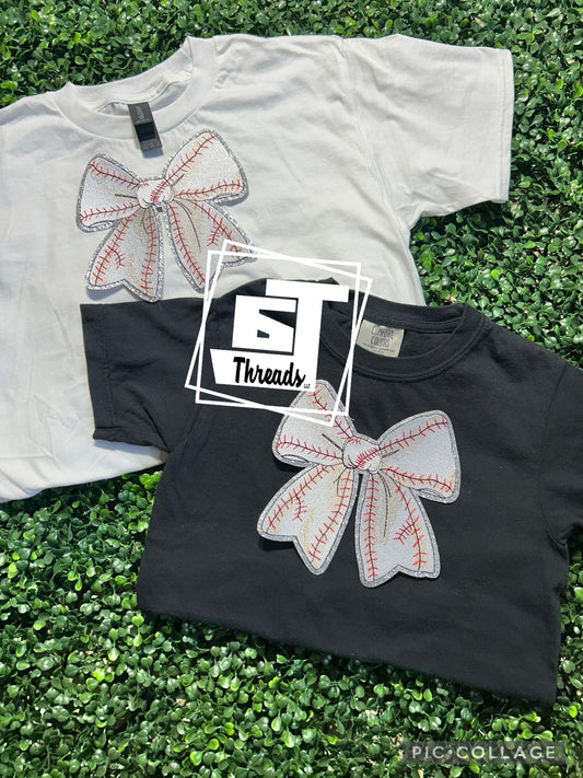 youth baseball bow patch on white shirt and black shirt
