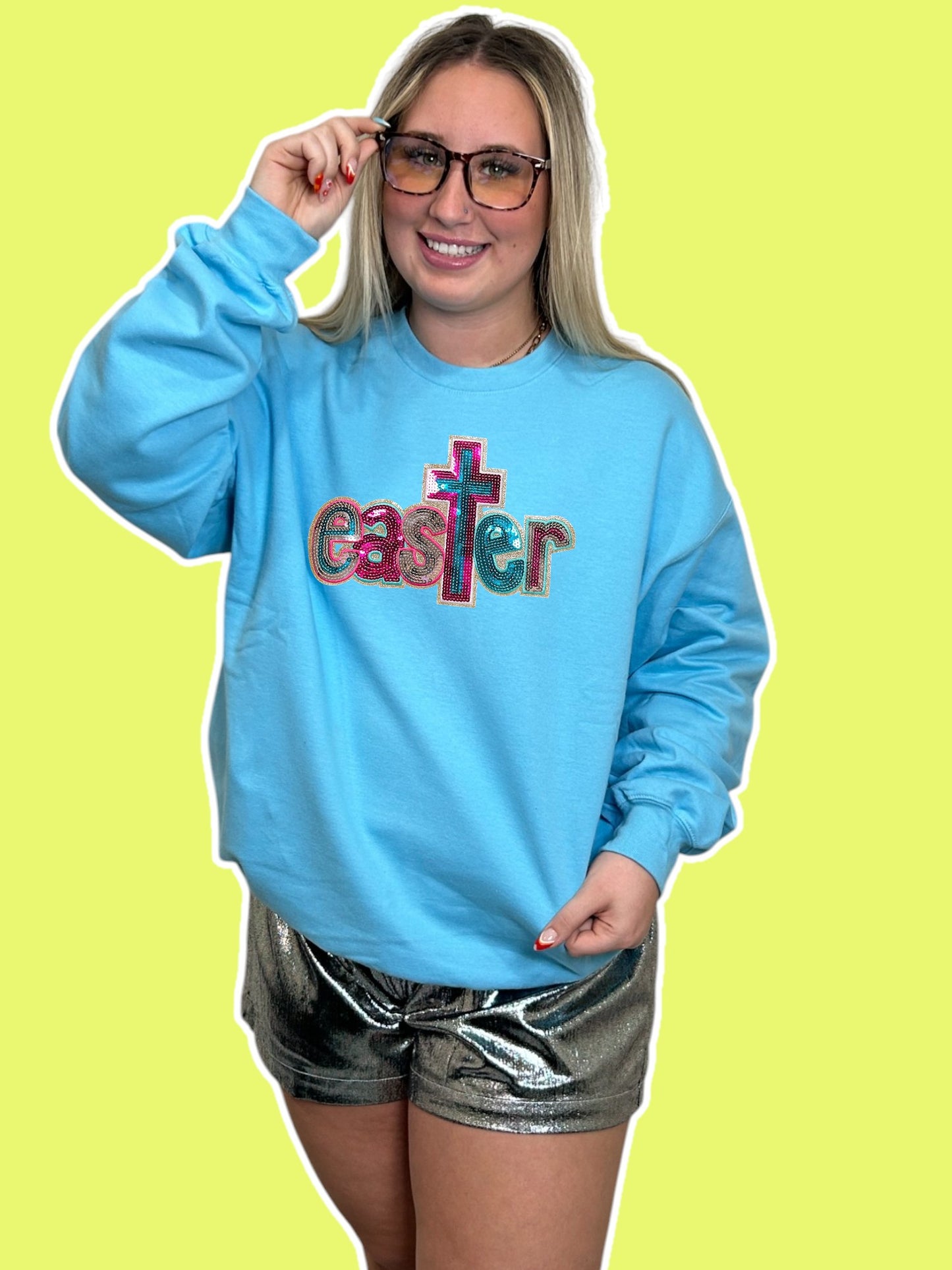 Sequins Easter with cross on a blue crewneck