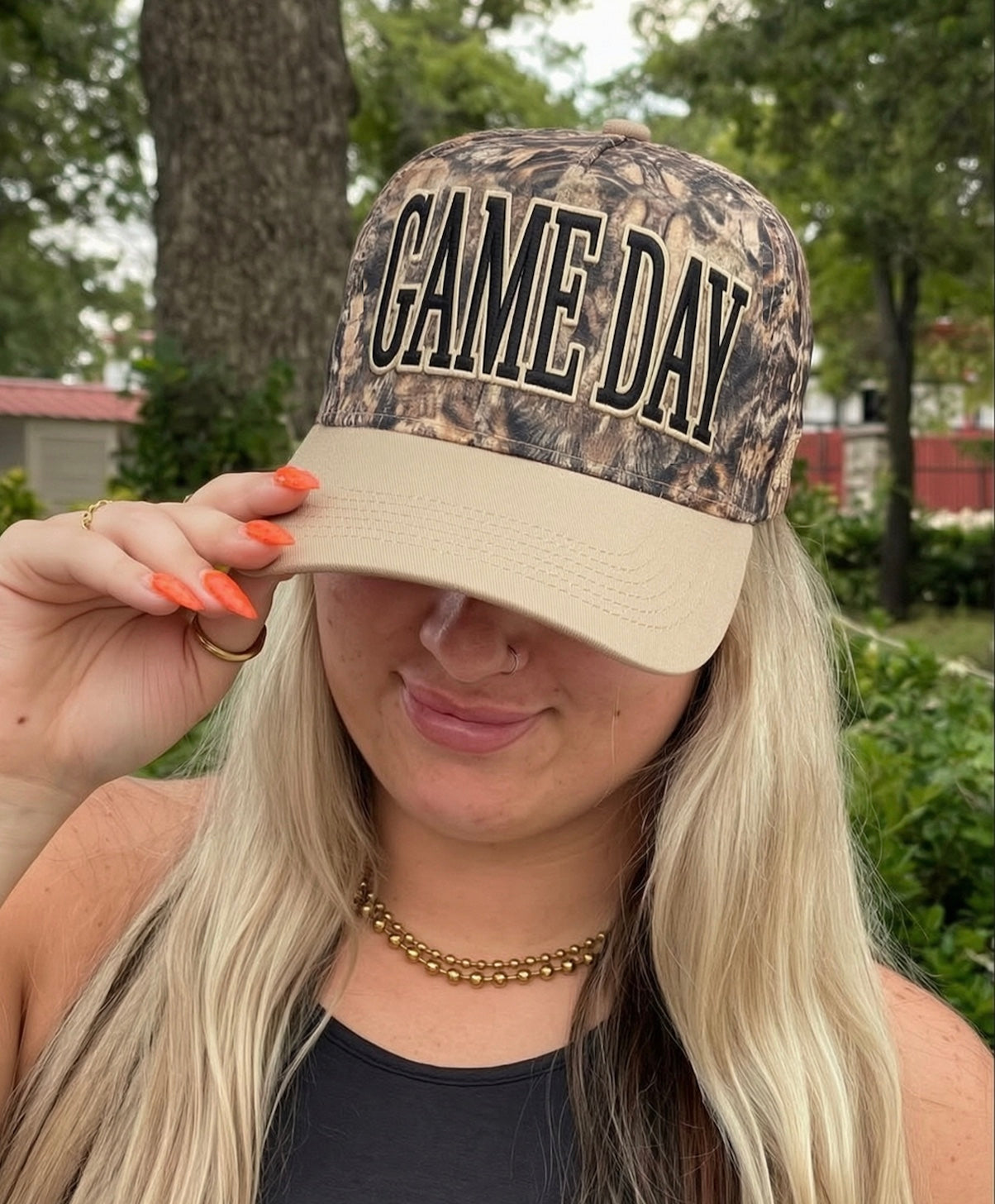 camo gamday cap with tan and black  outline