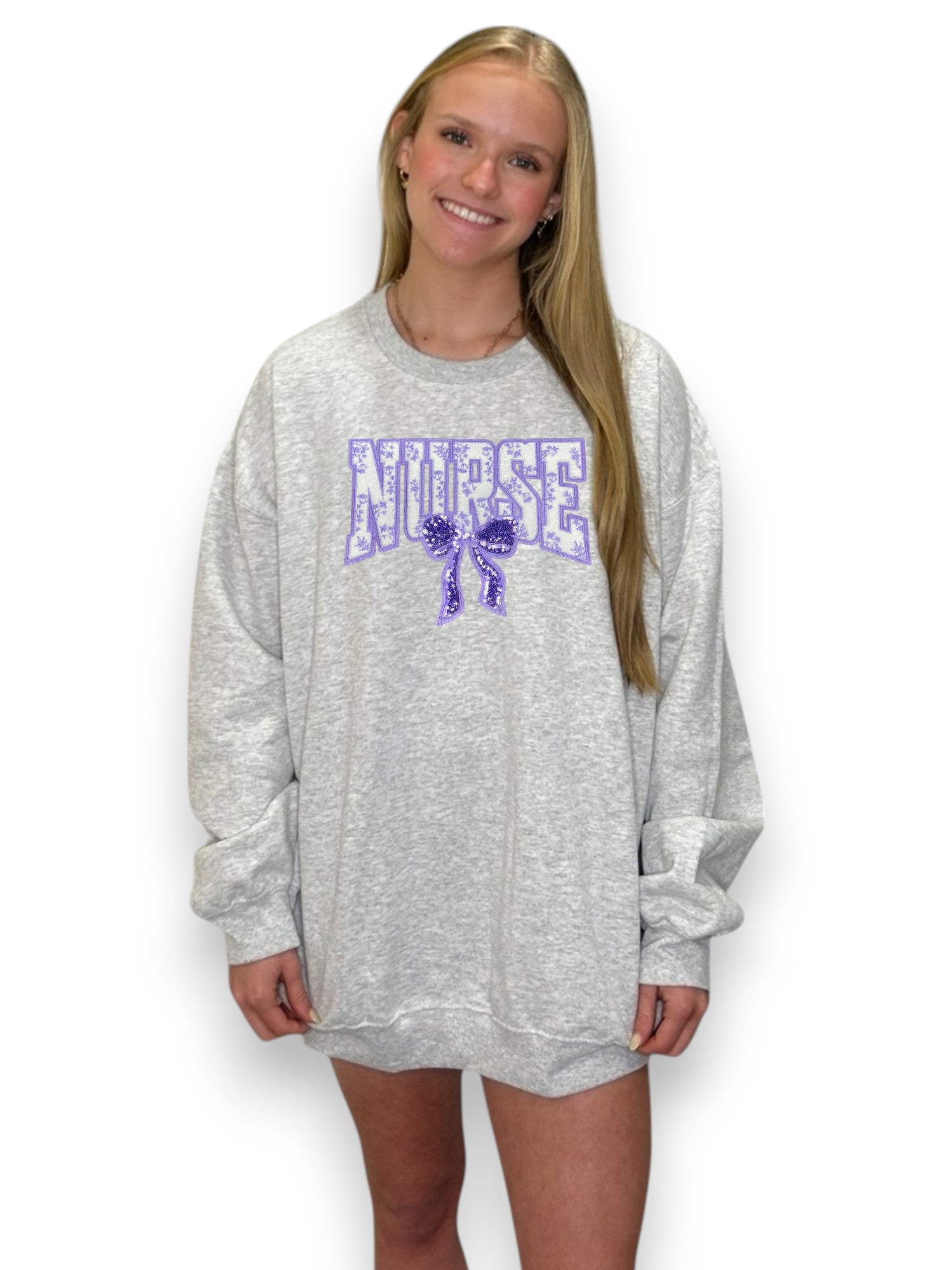 Purple Chenille Nurse with Bow 