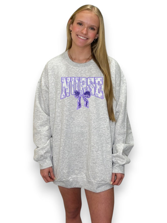 Purple Chenille Nurse with Bow 