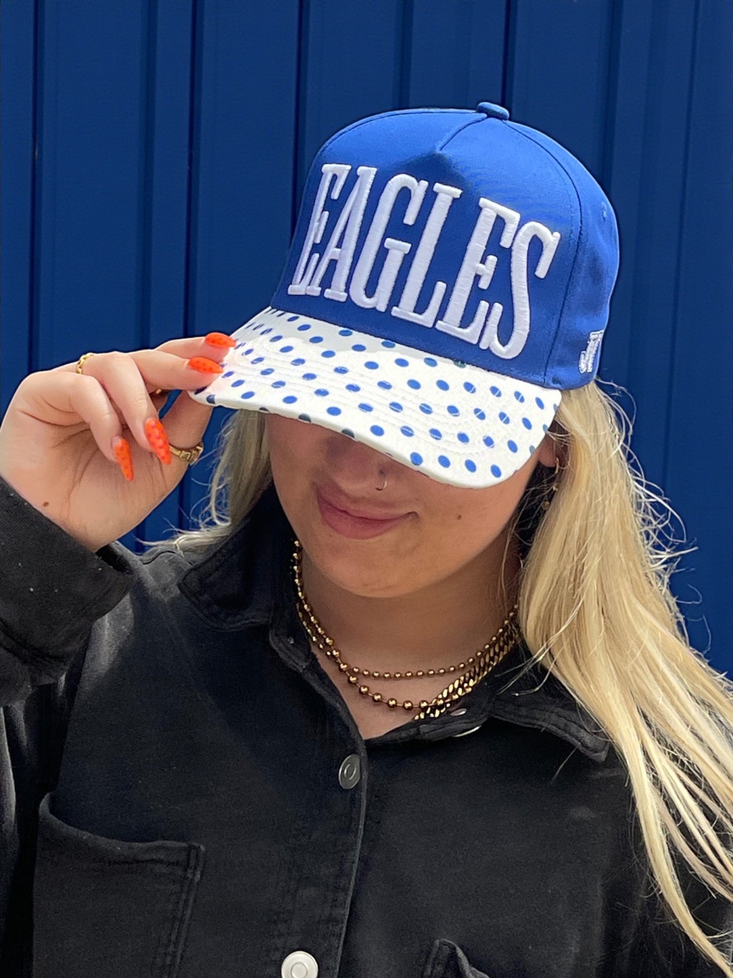 blue and white polka dot eagles cap